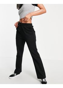 Urban Revivo flared plisse trousers in black