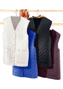 Damska Pre&scaron;&iacute;van&aacute; vesta s vatovan&iacute;m vlnen&aacute; biela veľkosť 56