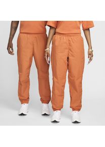 Nike NOCTA Northstar nylon trainingsbroek - Oranje