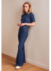 King Louie Flare Onyx Denim Jumpsuit in tiefem Blau.