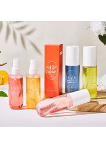Natural alcohol-free and low-allergen liquid perfume spray that can be used on hair body and clothing Water-based natural oil