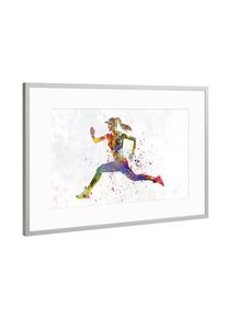 Poster with silver metal frame "Female runner in watercolor-c" artboxONE Framed Poster