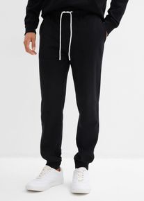 Joggingbyxa med ribbad mudd i bensluten - svart - storlek 52/54 (L) - bonprix