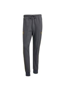 ADIDAS ORIGINALS Spodnie sportowe 'Manchester United Terrace Icons' dla mężczyzn curry / czarny Rozmiar S