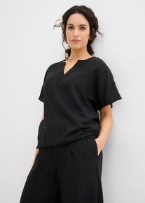 Oversize-Bluse mit Elastiksaum, schwarz, Größe 48, bonprix