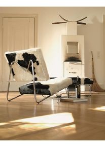 Hirche Lounge Chair fauteuil peau de vache Richard Lampert avec tabouret / peau de vache noir-blanc
