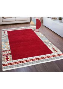 Theko , Wollteppich »Nuno, reine Wolle, Handgefertigt, mit Bordüre« rechteckig 14 mm Höhe handgetuftet, Wohnzimmer, Schlafzimmer, Esszimmer, auch...