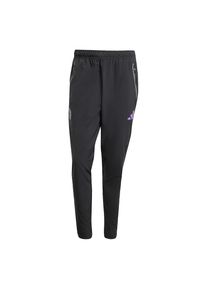 adidas Performance Spodnie sportowe 'Manchester United Tiro 25' dla mężczyzn fioletowy / czarny Rozmiar XS