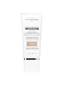 Institut Esthederm Photo Reverse Protective Anti-Dark Spots Tinted Face Care v&eacute;dő &eacute;s toniz&aacute;l&oacute; kr&eacute;m a pigmentfoltok ellen magas UV v&eacute;delemmel &aacute;rnyalat Light Beige 50 ml