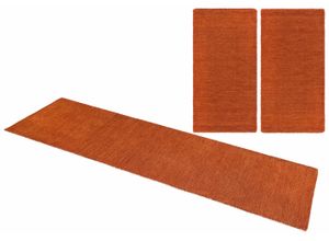 Bettumrandung THEKO "Gabbeh Uni, Handweb Teppich, meliert, reine Wolle" Gr. 14, orange (rostorange), H:14mm, Obermaterial: 100% Wolle, Bettumrandung, Bettvorleger, Uni-Farben, handgewebt, Läufer-Set, Schlafzimmer
