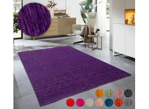 Wollteppich THEKO "Holi", lila (violett), B:70cm H:13mm L:140cm, Schurwolle, Teppiche, Uni-Farben, leicht meliert, reine Wolle, handgewebt mit Knüpfoptik